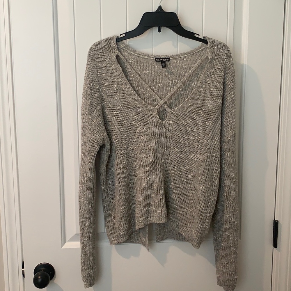 Super soft gray express sweater. Slit in the back.